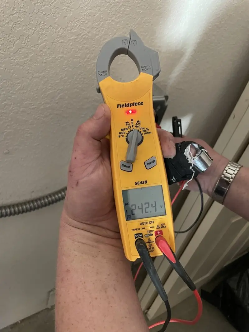 Voltage testing with clamp meter during Aluminum Wiring Replacement in Jonesboro